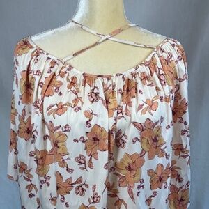 Intimately Free People Cross Over Straps loose fitting shirt in size Small.